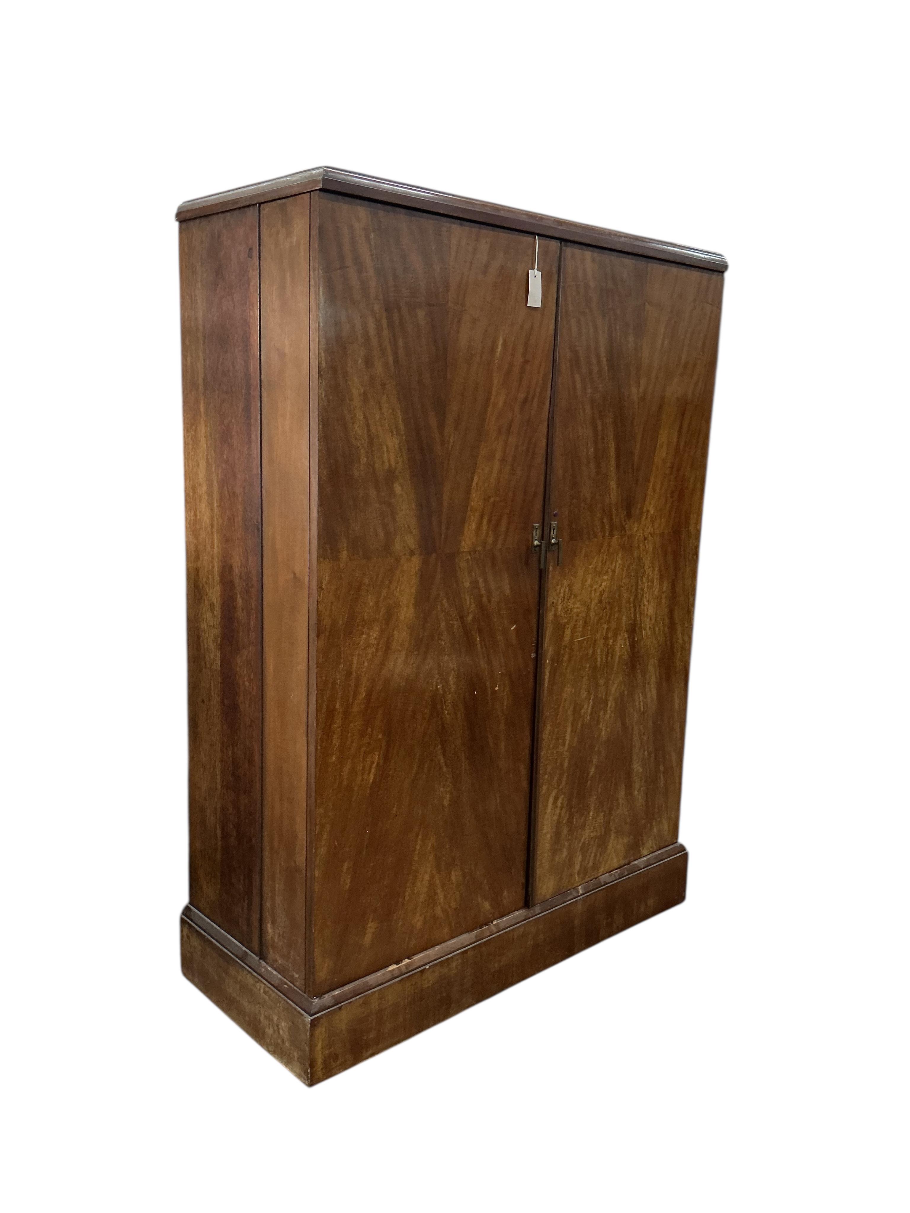 An early 20th century mahogany Patent Compactum wardrobe, width 120cm, depth 52cm, height 173cm